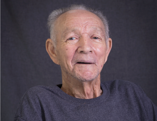 older adult man smiling for professional headshot photo
