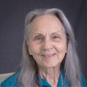 older adult woman smiling for professional headshot photo