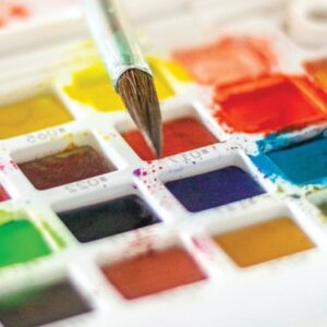 watercolor palette and paintbrush